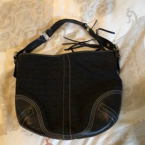 Women's black coach purse